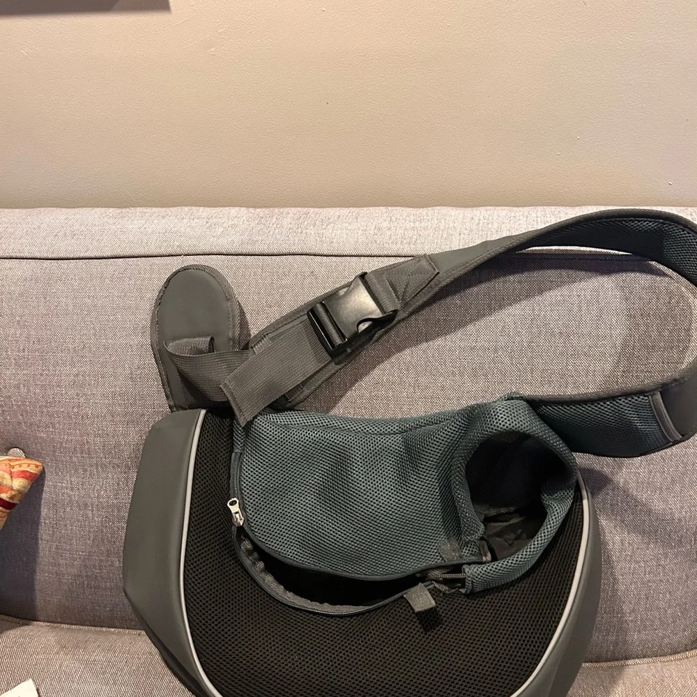 Brand new Pet Carrier. Grey/black. Holds up to 15 lbs.